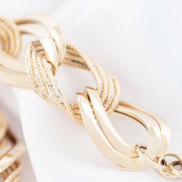 Pulsera eslabón trenzado en oro amarillo 14 kilates.