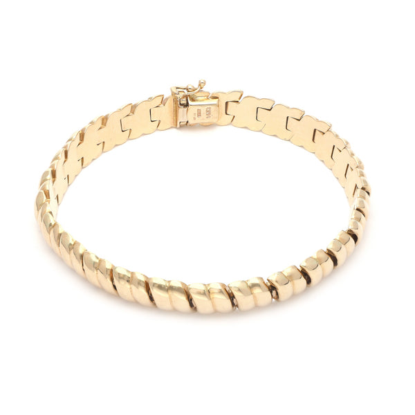 Pulsera eslabón articulado en oro amarillo 14 kilates.