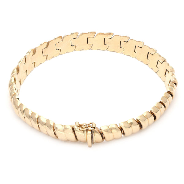 Pulsera eslabón articulado en oro amarillo 14 kilates.