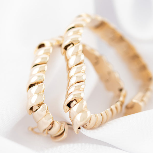 Pulsera eslabón articulado en oro amarillo 14 kilates.