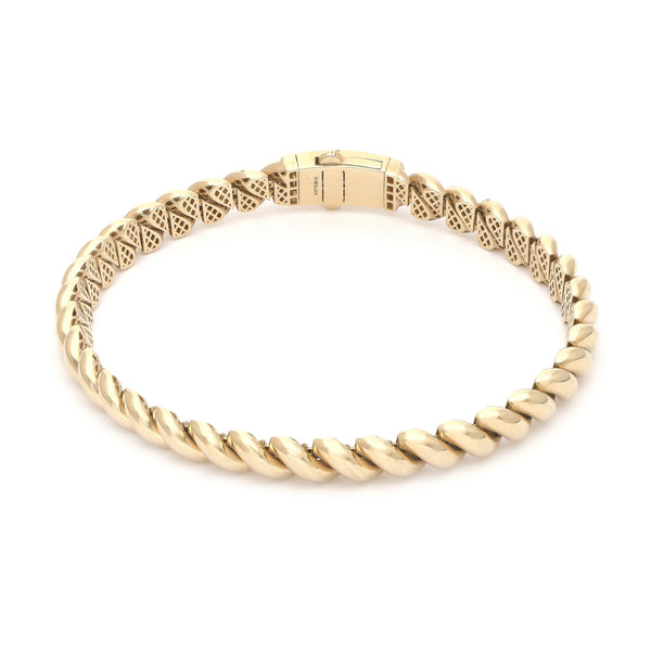 Pulsera eslabón articulado con circonias en oro amarillo 14 kilates.