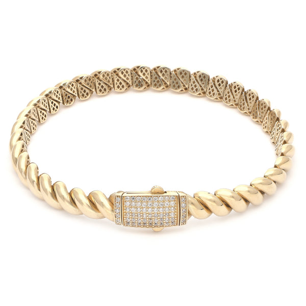 Pulsera eslabón articulado con circonias en oro amarillo 14 kilates.