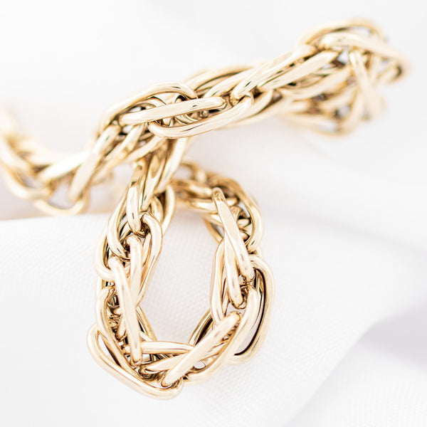 Pulsera eslabón torzal en oro amarillo 14 kilates.