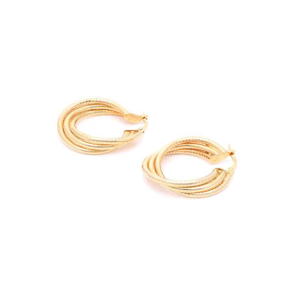 Arracadas labradas en oro amarillo 14 kilates.