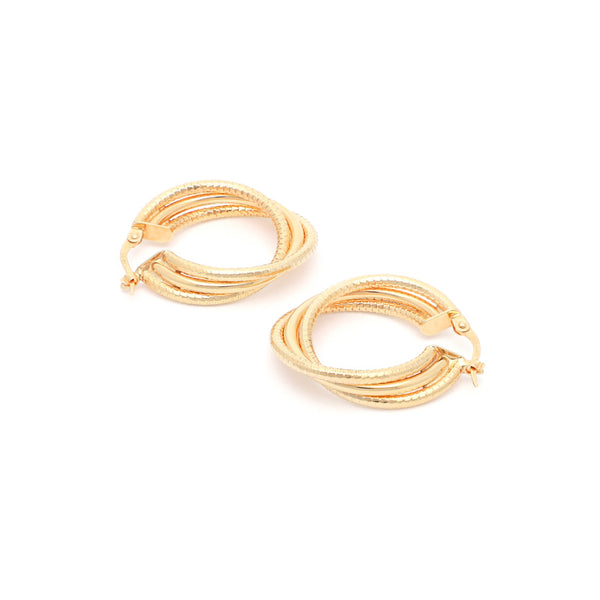 Arracadas labradas en oro amarillo 14 kilates.