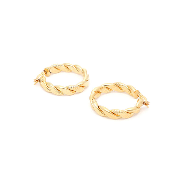 Arracadas trenzadas en oro amarillo 14 kilates.