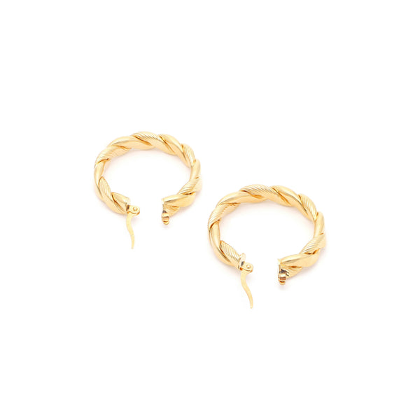 Arracadas trenzadas en oro amarillo 14 kilates.