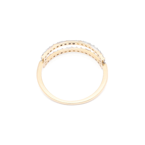 Anillo calado con circonias en oro amarillo 14 kilates.