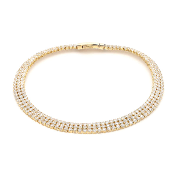 Pulsera eslabón articulado con circonias en oro amarillo 14 kilates.