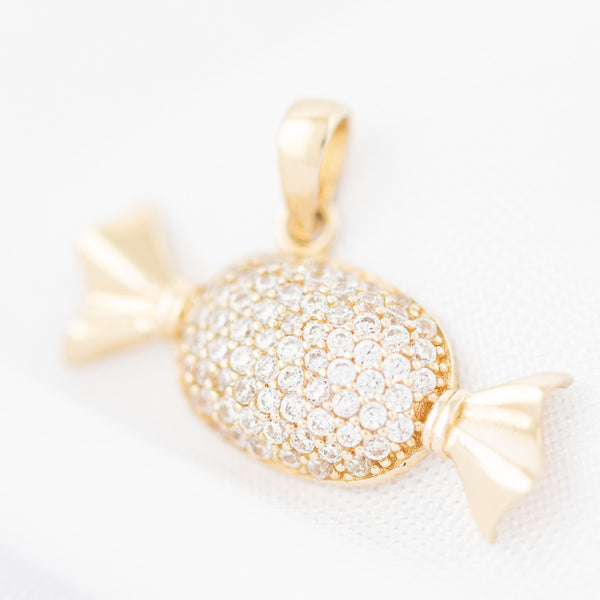 Dije diseño especial motivo caramelo con circonias en oro amarillo 14 kilates.