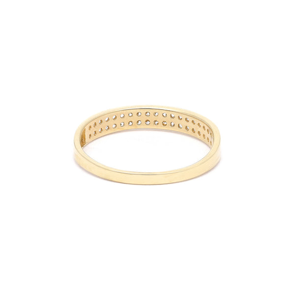 Anillo diseño especial con circonias en oro amarillo 14 kilates.