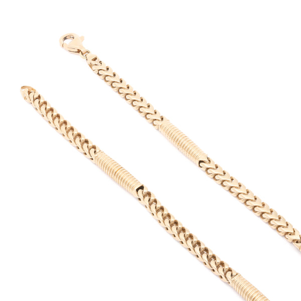 Pulsera eslabón combinado en oro amarillo 14 kilates.