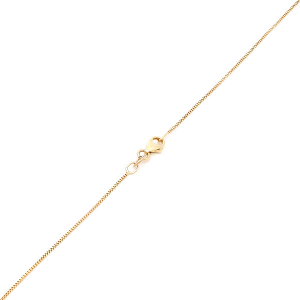 Juego de gargantilla eslabón cuadrado cruzado con dije y aretes diseño especial con sintéticos en oro amarillo 14 kilates.