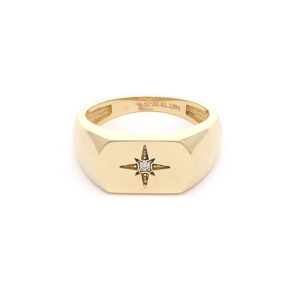 Anillo liso con circonia en oro amarillo 14 kilates.