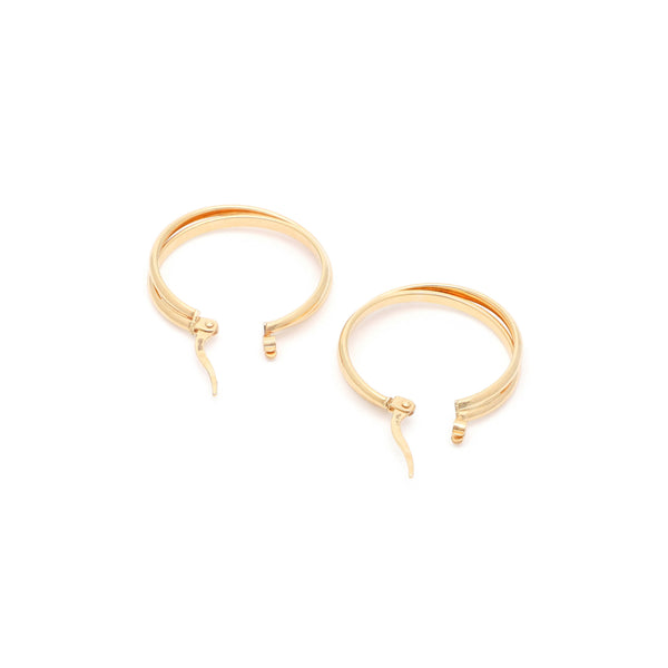 Arracadas lisas en oro amarillo 14 kilates.