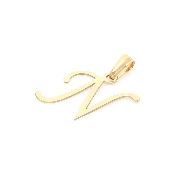 Dije liso motivo letra N en oro amarillo 14 kilates.