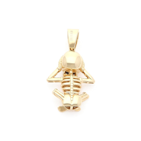 Dije diseño especial motivo esqueleto con sintéticos en oro amarillo 14 kilates.