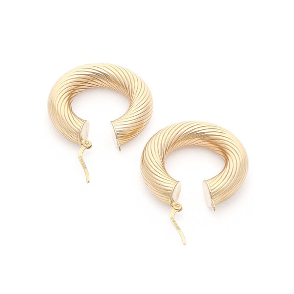 Arracadas huecas en oro amarillo 14 kilates.