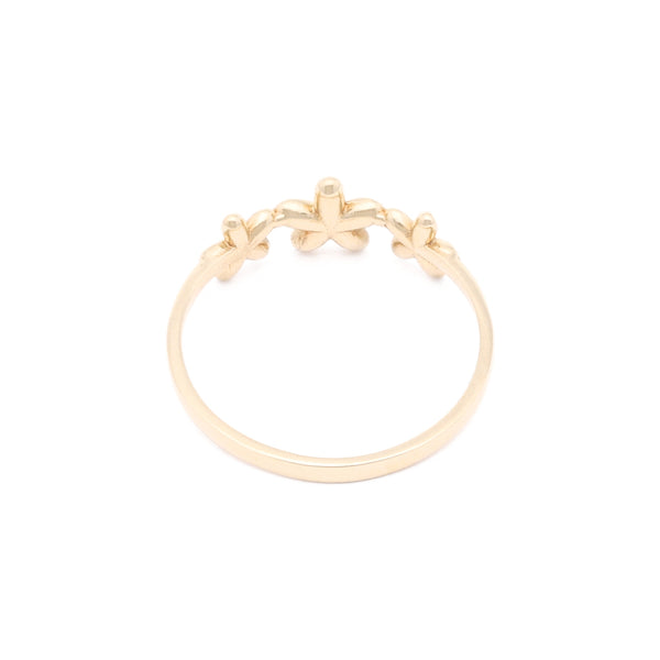Anillo diseño especial motivo flores en oro amarillo 14 kilates.