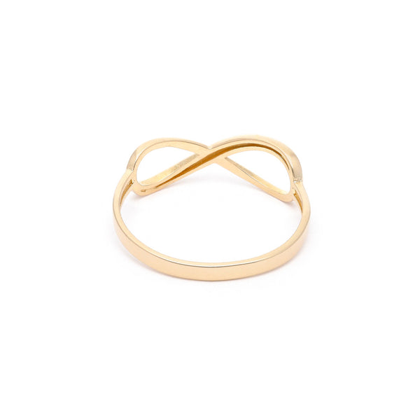 Anillo calado motivo infinito en oro amarillo 14 kilates.