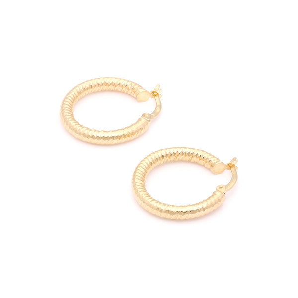 Arracadas martilladas en oro amarillo 14 kilates.
