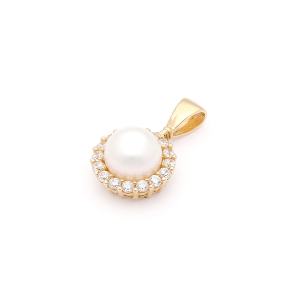 Dije diseño especial con perla y circonias en oro amarillo 14 kilates.