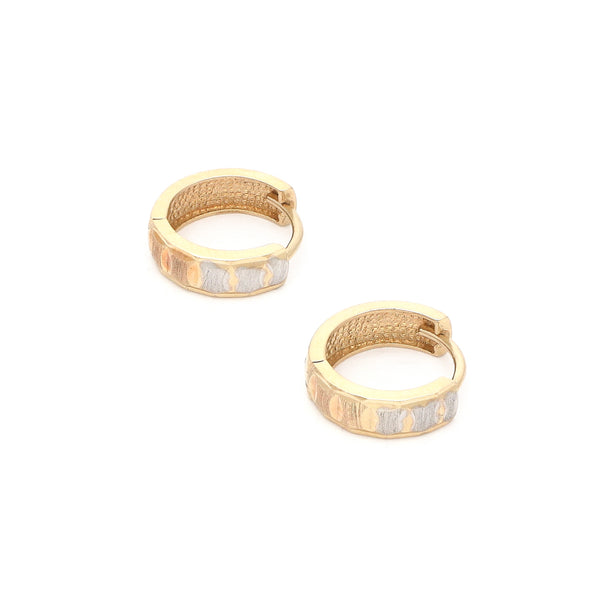 Arracadas articuladas en oro amarillo 14 kilates.