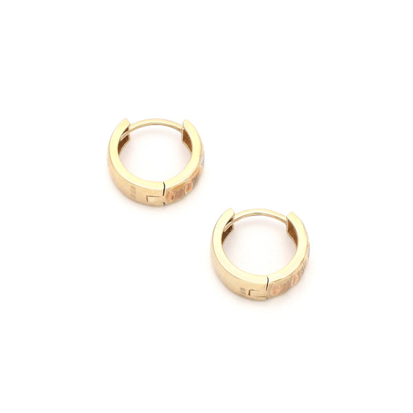 Arracadas articuladas en oro amarillo 14 kilates.