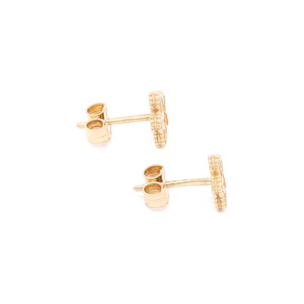 Aretes diseño especial con circonias motivo flor en oro amarillo 14 kilates.