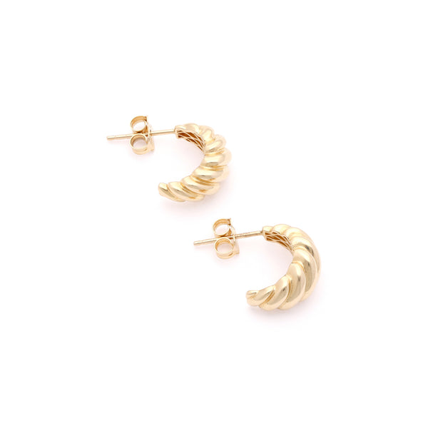Aretes torzales en oro amarillo 14 kilates.