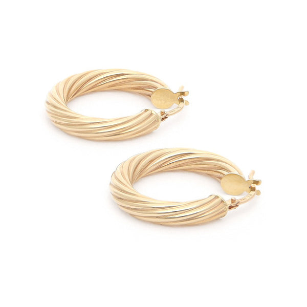 Arracadas torzal en oro amarillo 14 kilates.