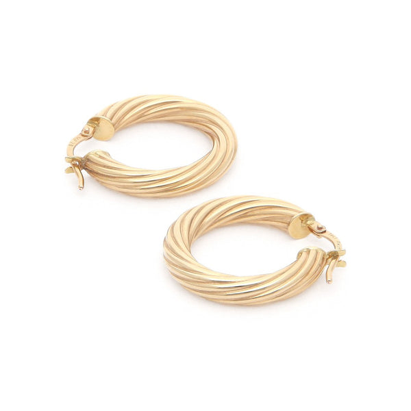 Arracadas torzal en oro amarillo 14 kilates.