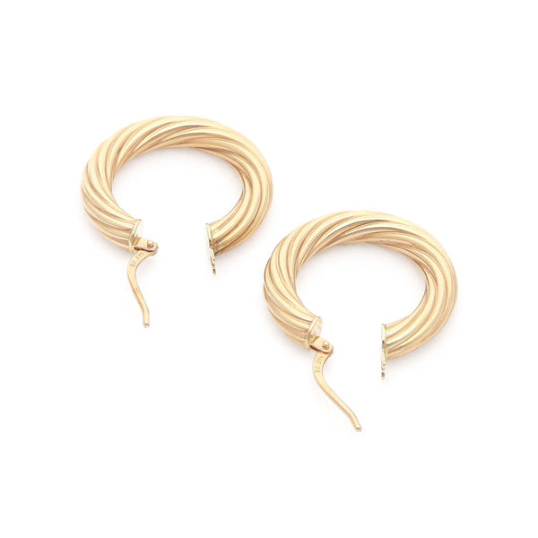 Arracadas torzal en oro amarillo 14 kilates.