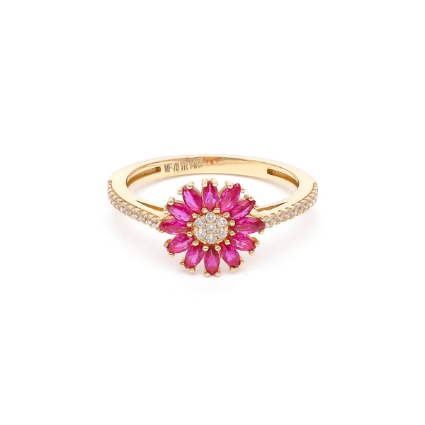 Anillo diseño especial motivo flor con circonias en oro amarillo 14 kilates.