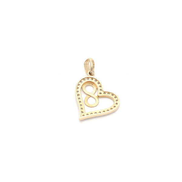 Dije calado motivo corazón con infinito con circonias en oro amarillo 14 kilates.