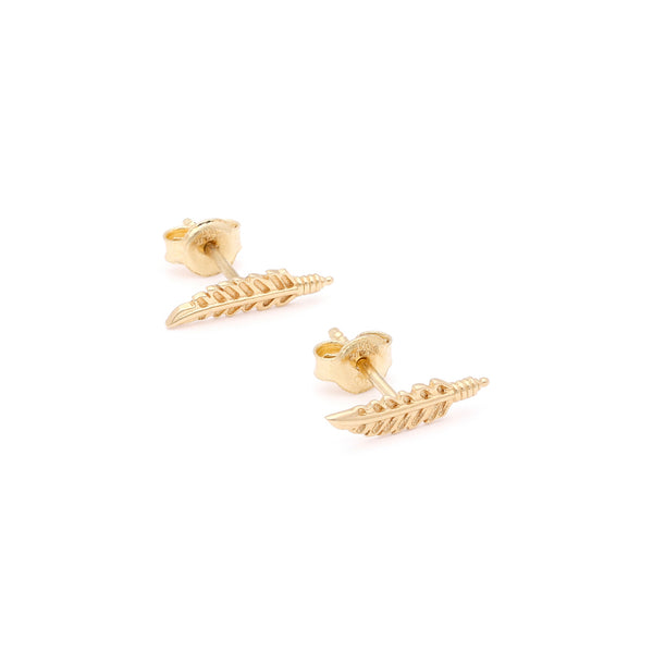 Aretes diseño especial motivo hoja en oro amarillo 14 kilates.