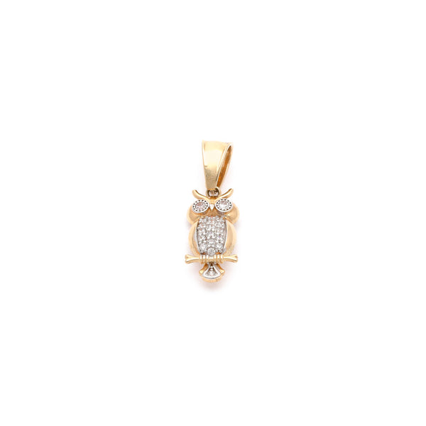 Dije diseño especial motivo búho con circonias en oro amarillo 14 kilates.