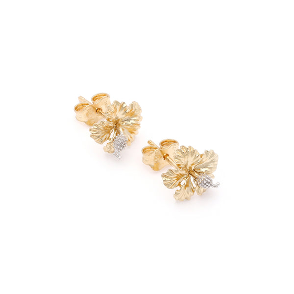 Aretes diseño especial motivo flor en oro dos tonos 14 kilates.