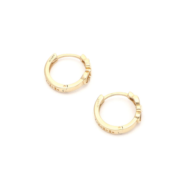Arracadas articuladas en oro amarillo 14 kilates.