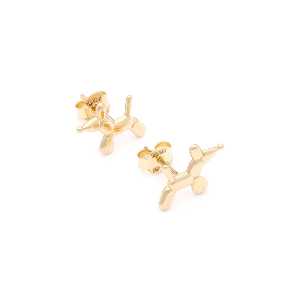 Aretes diseño especial motivo perro en oro amarillo 14 kilates.