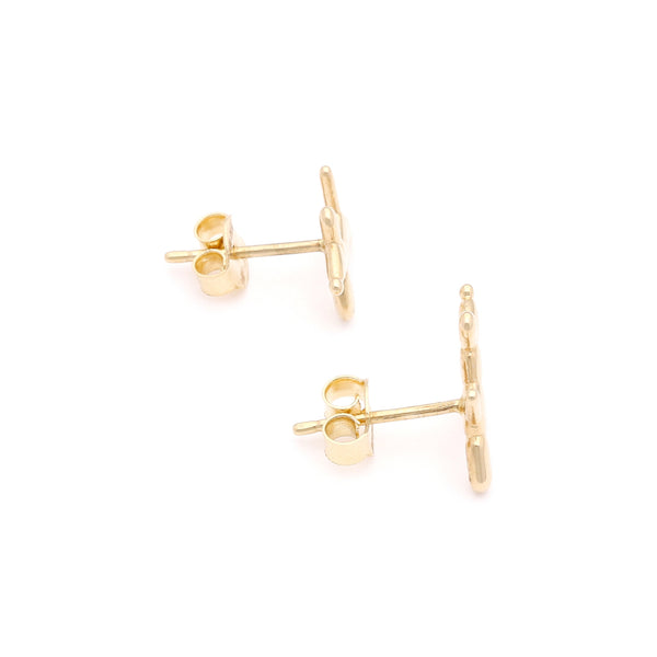 Aretes diseño especial motivo perro en oro amarillo 14 kilates.