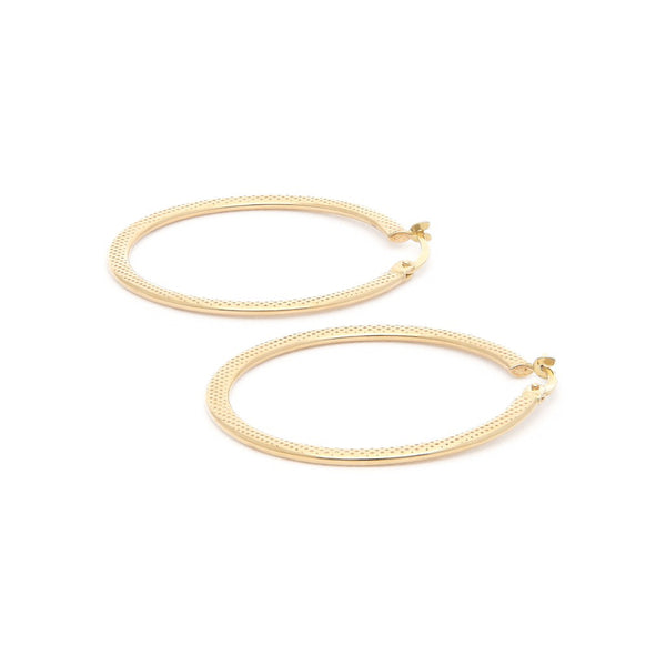 Arracadas Martilladas en oro amarillo 14 kilates.