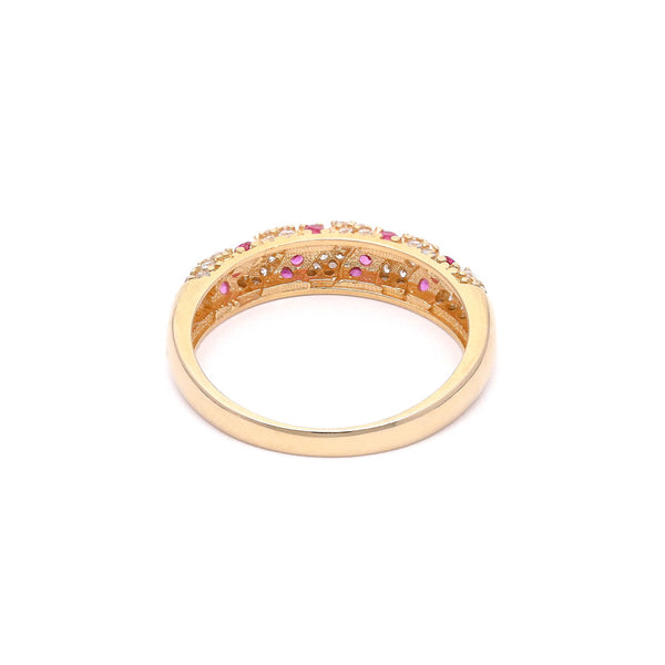 Anillo diseño especial con sintéticos en oro amarillo 14 kilates.