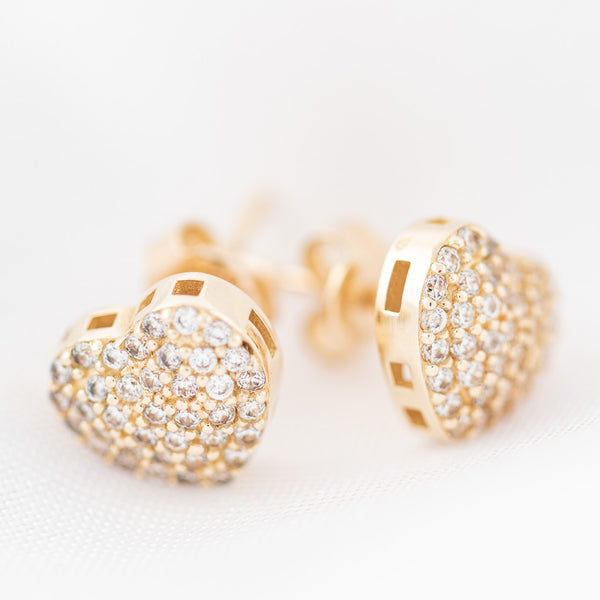 Aretes diseño especial motivo corazón con circonias en oro amarillo 14 kilates.