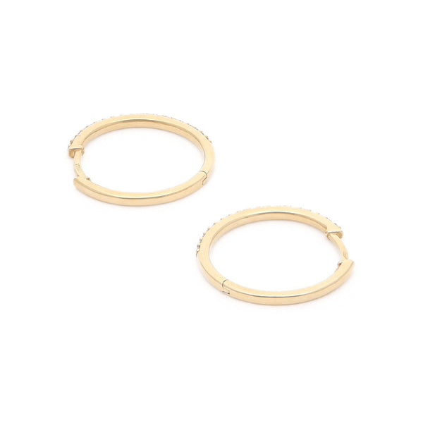Arracadas lisas con circonias en oro amarillo 14 kilates.