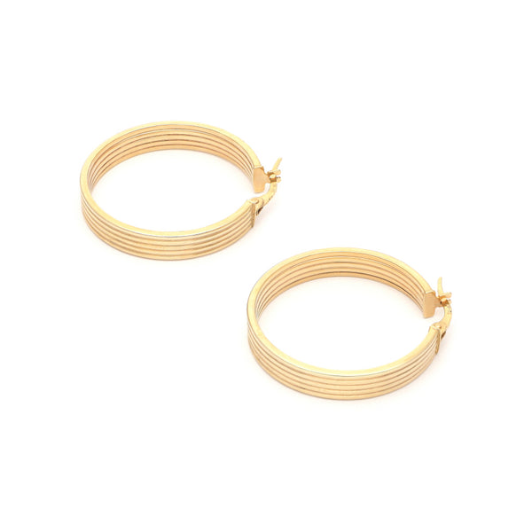 Arracadas acanaladas en oro amarillo 14 kilates.