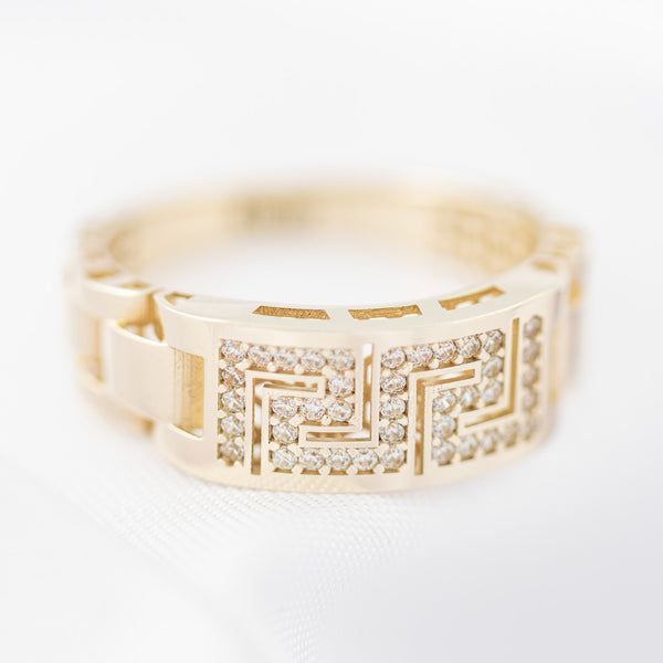 Anillo diseño especial motivo grecas con circonias en oro amarillo 14 kilates.
