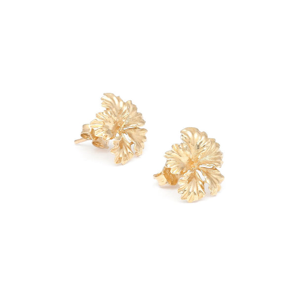 Aretes diseño especial motivo flor en oro amarillo 14 kilates.