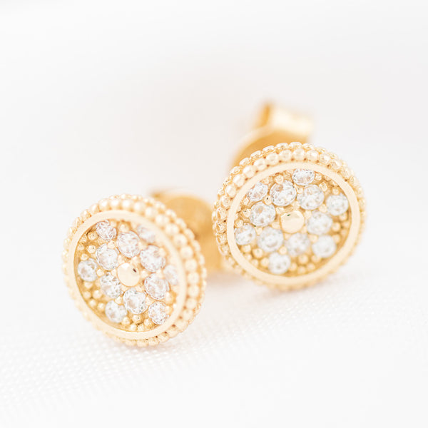 Aretes diseño especial con circonias en oro amarillo 14 kilates.