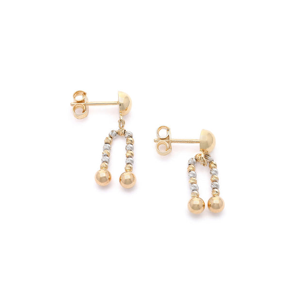 Aretes boleados con colgantes en oro dos tonos 14 kilates.
